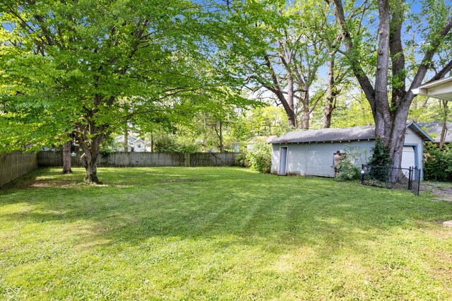 view of yard featuring a garage