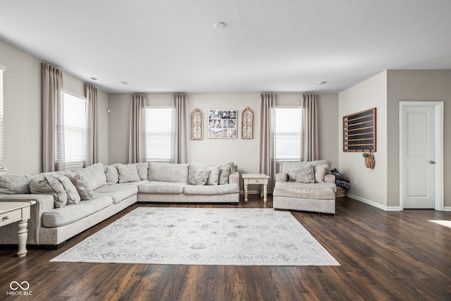 living room with baseboards and dark wood-style floors