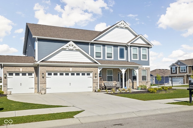 craftsman-style home with a porch, concrete driveway, roof with shingles, and a garage