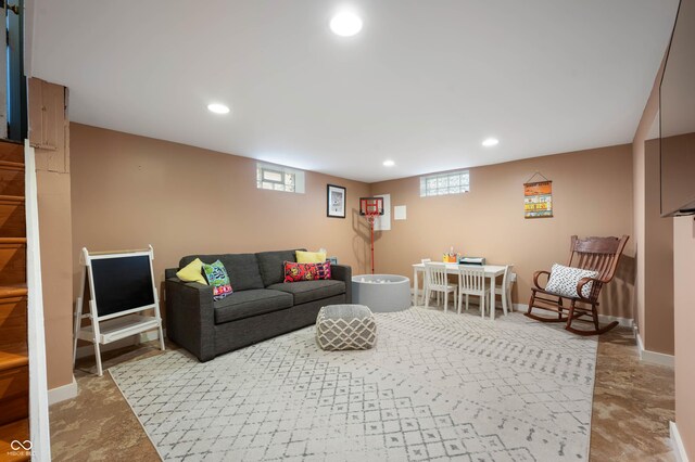 living area with plenty of natural light, recessed lighting, and baseboards