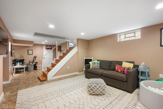 living area with baseboards, recessed lighting, and stairs