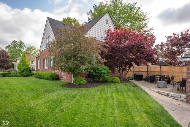 view of yard with a patio area