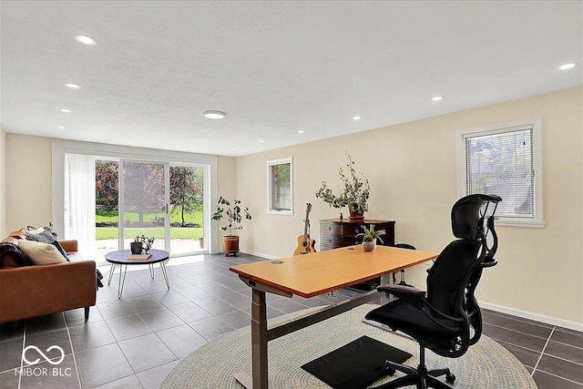 office space featuring baseboards, tile patterned flooring, and recessed lighting