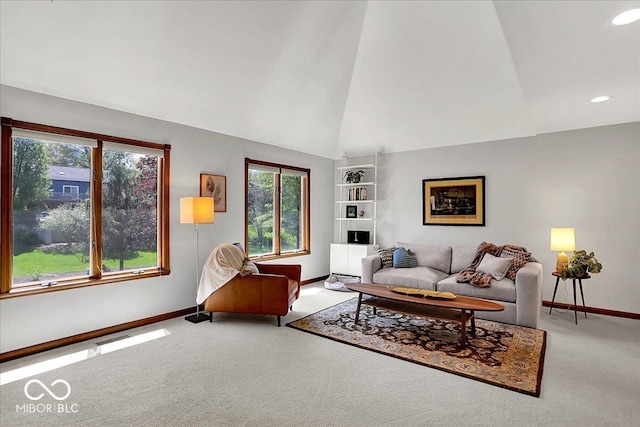 carpeted living room featuring baseboards, recessed lighting, and lofted ceiling