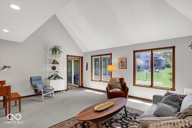 living room with recessed lighting, baseboards, carpet, and high vaulted ceiling
