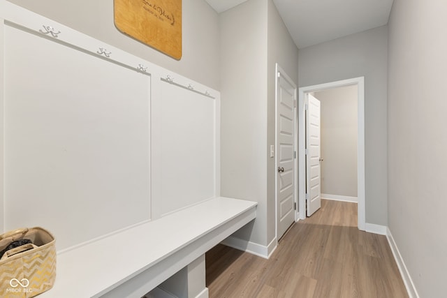 8673 Laurelton Pl, Brownsburg, IN 46112 - mudroom featuring baseboards and light wood-style floors