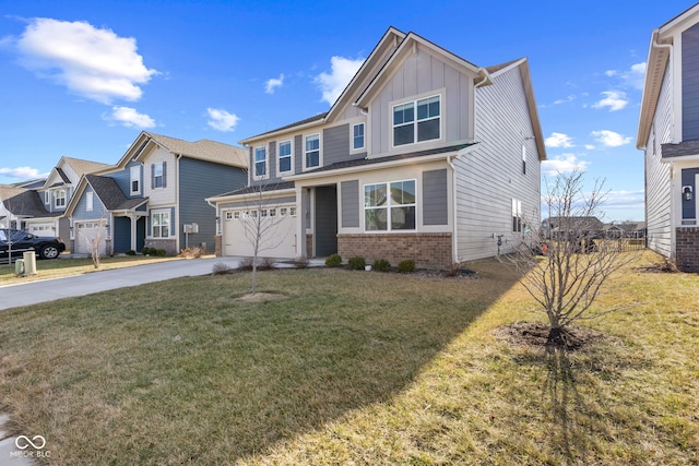 8673 Laurelton Pl, Brownsburg, IN 46112 - view of front of property featuring a front lawn, driveway, board and batten siding, an attached garage, and brick siding