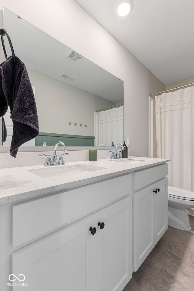 8673 Laurelton Pl, Brownsburg, IN 46112 - full bath featuring visible vents, a sink, and toilet