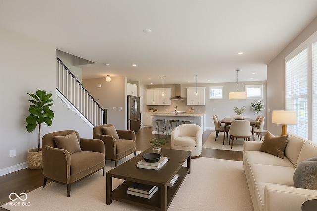 14878 Horse Branch Way, Fishers, IN 46040 - living room featuring recessed lighting, baseboards, wood finished floors, and stairs