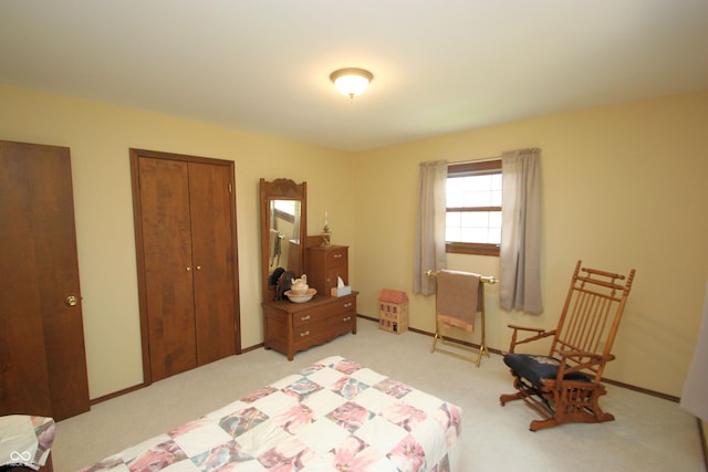 carpeted bedroom with a closet