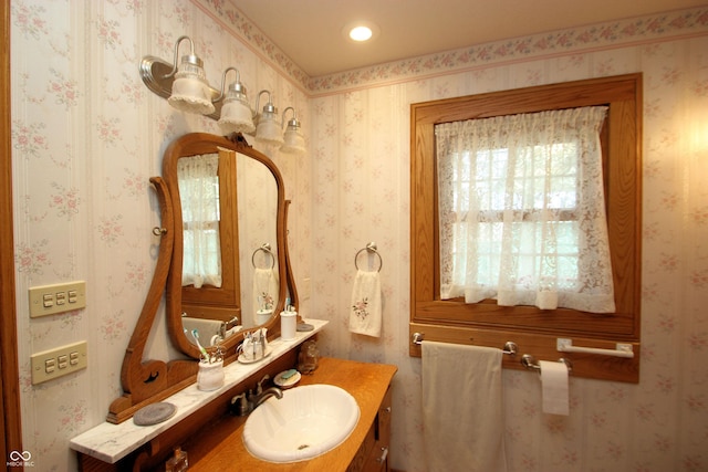 bathroom with vanity and recessed lighting