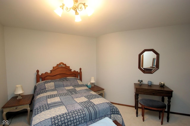 bedroom with carpet flooring and baseboards