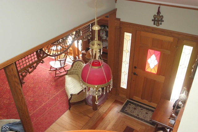 foyer entrance with hardwood / wood-style flooring