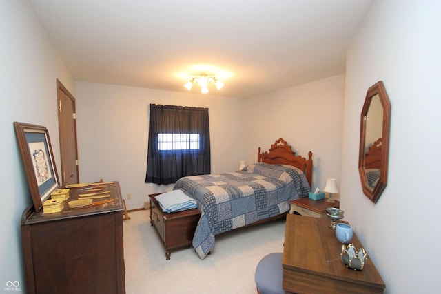 bedroom with light carpet