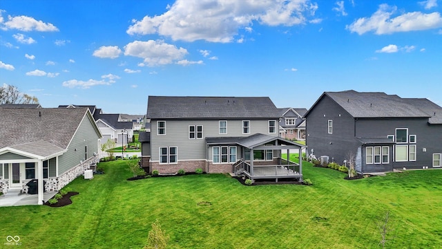 132 Oakhurst Way, Westfield, IN 46074 - rear view of house featuring a residential view, a patio, a lawn, and a wooden deck