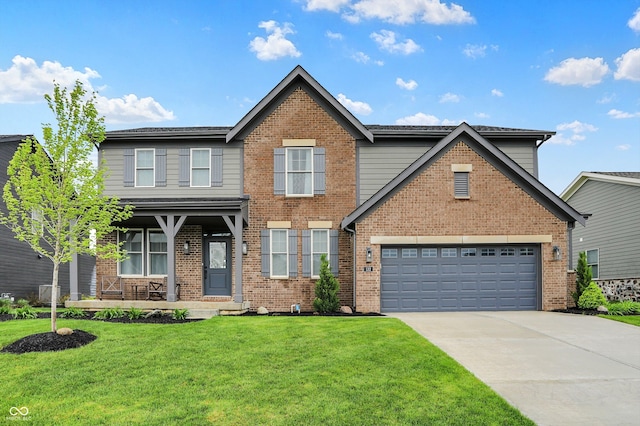 132 Oakhurst Way, Westfield, IN 46074 - traditional-style house with a porch, a front yard, brick siding, concrete driveway, and an attached garage
