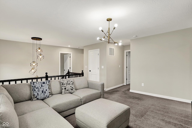132 Oakhurst Way, Westfield, IN 46074 - living area featuring visible vents, baseboards, dark carpet, and a notable chandelier