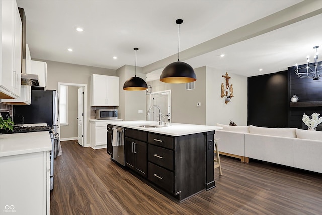 132 Oakhurst Way, Westfield, IN 46074 - kitchen with white cabinetry, appliances with stainless steel finishes, dark wood-style floors, and a sink