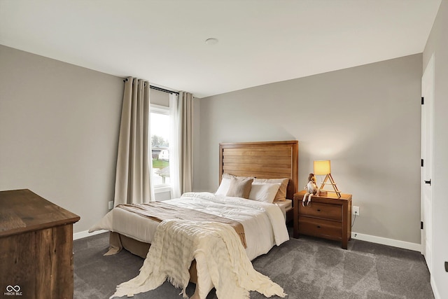 132 Oakhurst Way, Westfield, IN 46074 - bedroom featuring baseboards and dark carpet