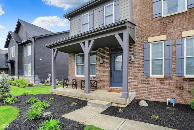 132 Oakhurst Way, Westfield, IN 46074 - entrance to property with a porch and brick siding