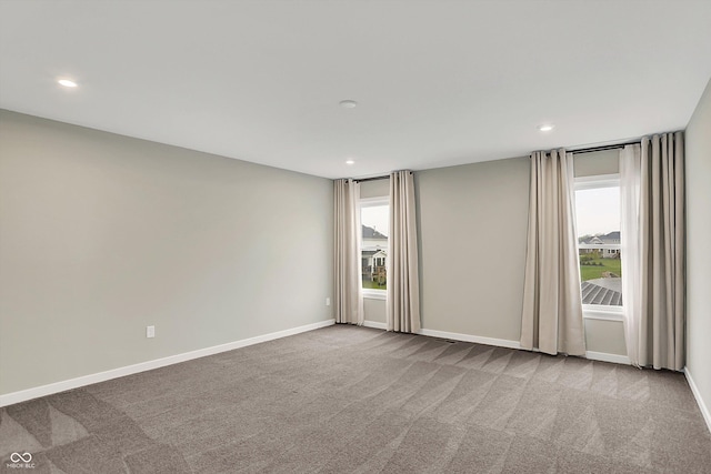132 Oakhurst Way, Westfield, IN 46074 - empty room featuring recessed lighting, carpet flooring, baseboards, and a healthy amount of sunlight