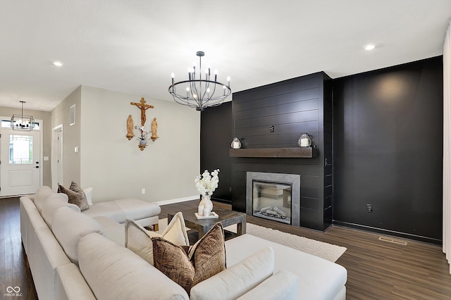 132 Oakhurst Way, Westfield, IN 46074 - living room featuring dark wood-style flooring, a chandelier, and visible vents