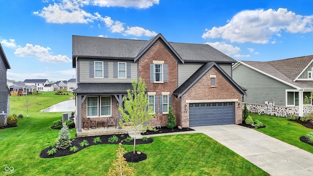 132 Oakhurst Way, Westfield, IN 46074 - view of front of property featuring brick siding, driveway, a shingled roof, and a front lawn