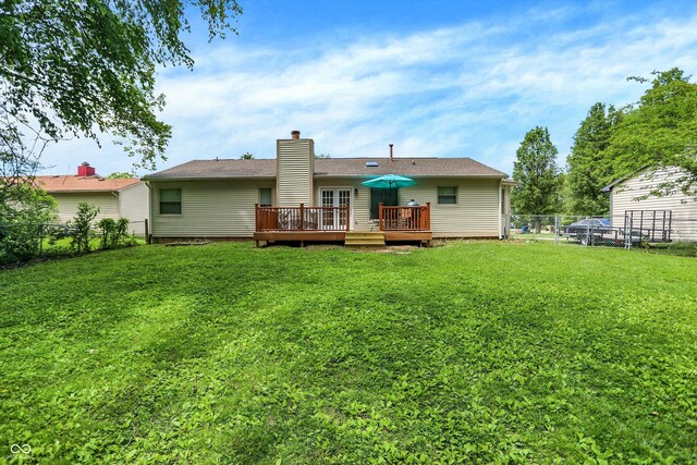 1697 Stacy Lynn Dr, Indianapolis, IN 46231 - back of property featuring a deck and a chimney