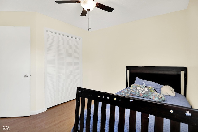 1697 Stacy Lynn Dr, Indianapolis, IN 46231 - bedroom with wood finished floors, baseboards, a closet, and a ceiling fan