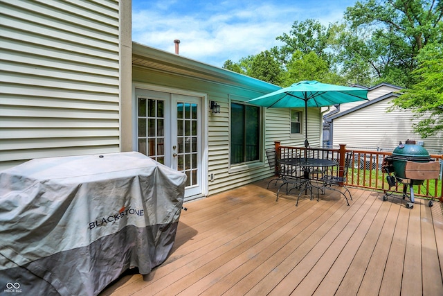 1697 Stacy Lynn Dr, Indianapolis, IN 46231 - wooden terrace featuring outdoor dining space, a grill, and french doors