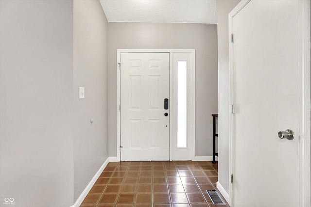 1697 Stacy Lynn Dr, Indianapolis, IN 46231 - tiled foyer entrance with baseboards