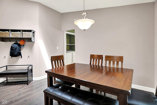 1697 Stacy Lynn Dr, Indianapolis, IN 46231 - dining room with wood finished floors, baseboards, and washer and dryer