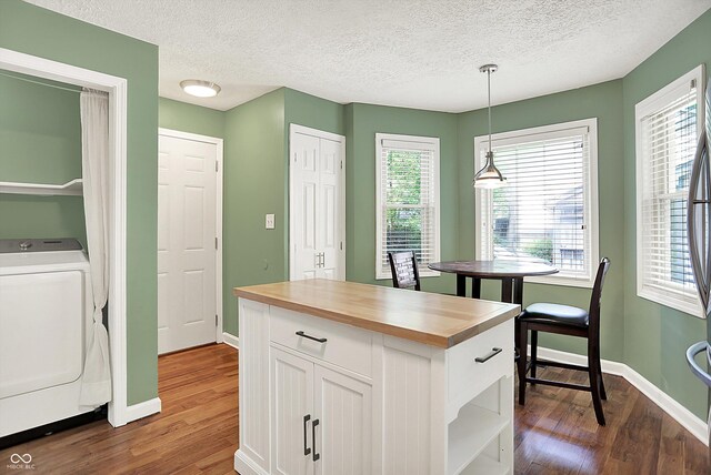 1697 Stacy Lynn Dr, Indianapolis, IN 46231 - kitchen featuring washer / dryer, butcher block countertops, dark wood finished floors, white cabinetry, and a textured ceiling