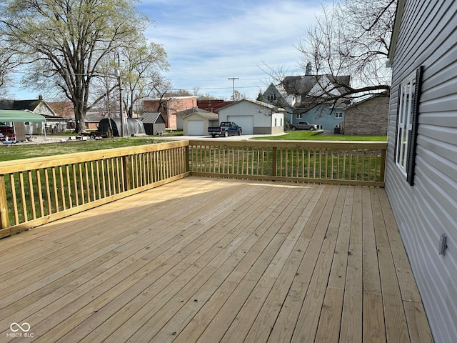 103 N Nebraska St, North Salem, IN 46165 - deck featuring a lawn, an outdoor structure, a residential view, and a garage