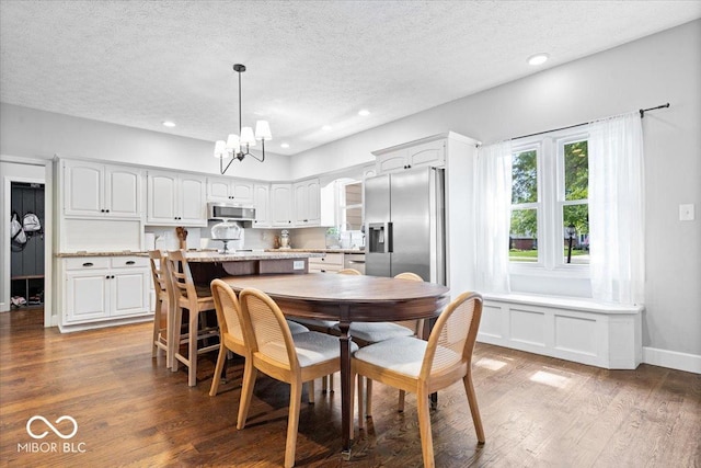 244 W Admiral Way S, Carmel, IN 46032 - dining area with a textured ceiling, a chandelier, recessed lighting, and wood finished floors