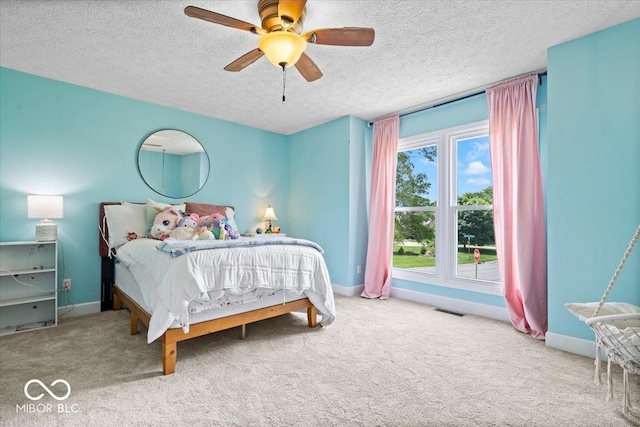 244 W Admiral Way S, Carmel, IN 46032 - carpeted bedroom featuring baseboards, ceiling fan, and a textured ceiling