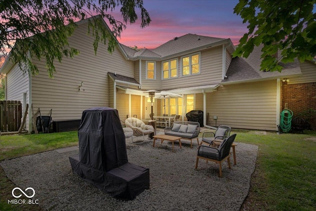 244 W Admiral Way S, Carmel, IN 46032 - back of property at dusk featuring an outdoor living space and roof with shingles