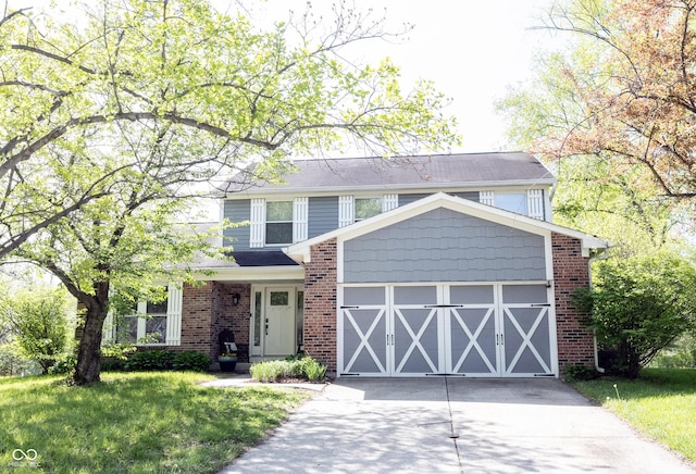 traditional home featuring concrete driveway, brick siding, an attached garage, and a front lawn