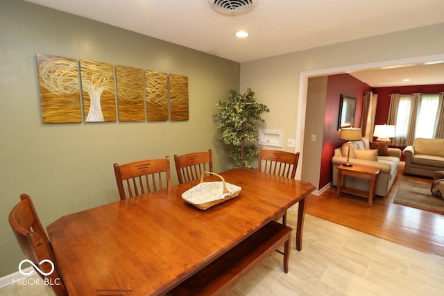 dining area featuring visible vents and recessed lighting