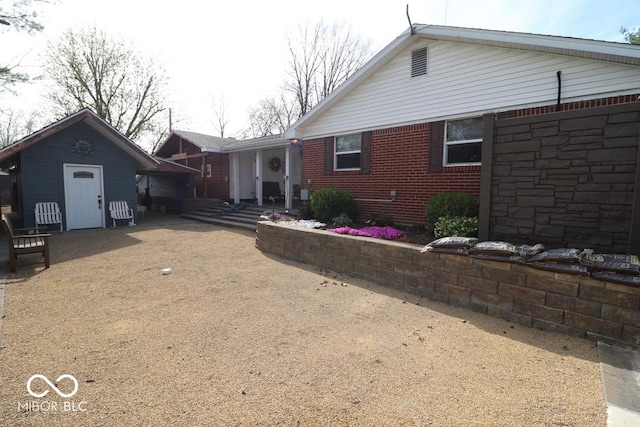 view of front facade with brick siding