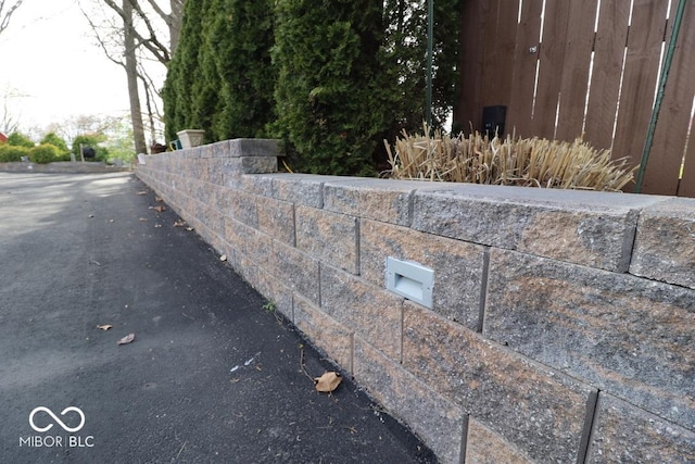 exterior details featuring fence