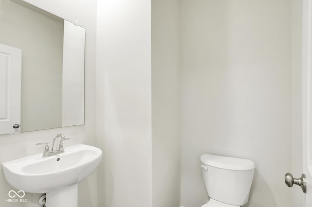 2764 Glade Ave, Plainfield, IN 46168 - bathroom featuring toilet and a sink