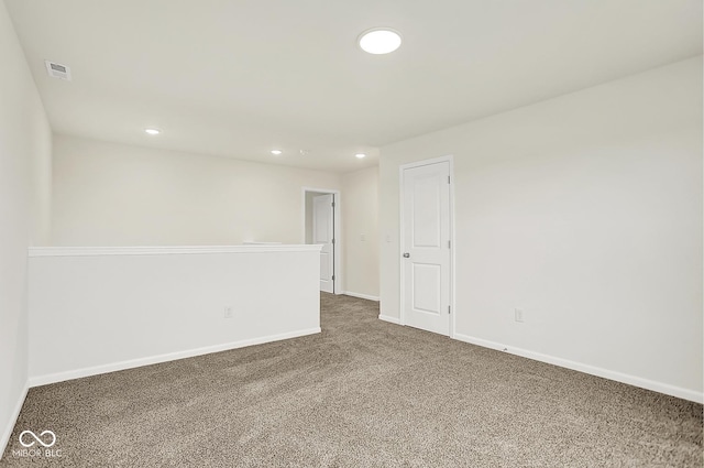 2764 Glade Ave, Plainfield, IN 46168 - unfurnished room featuring dark carpet, baseboards, and recessed lighting