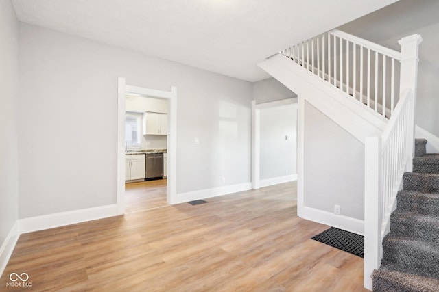 2114 N Dexter St, Indianapolis, IN 46202 - interior space with stairway, baseboards, visible vents, and light wood-type flooring