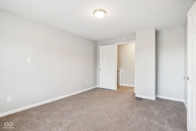 2114 N Dexter St, Indianapolis, IN 46202 - unfurnished bedroom featuring visible vents, baseboards, and carpet flooring