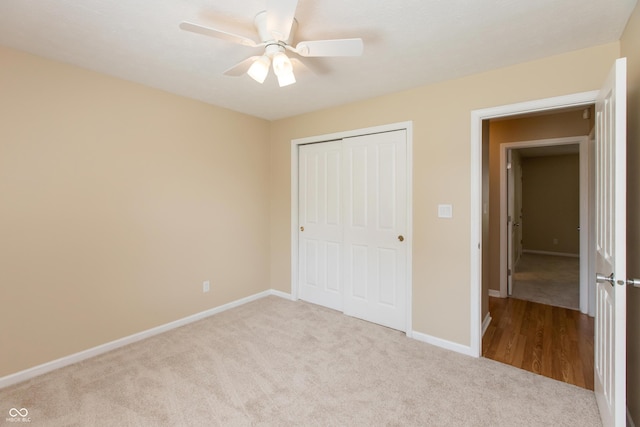 1579 Winding Creek Trl, Brownsburg, IN 46112 - unfurnished bedroom with carpet flooring, a closet, and a ceiling fan