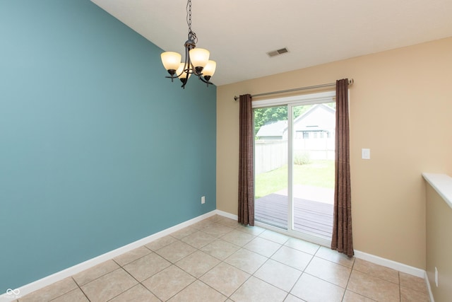 1579 Winding Creek Trl, Brownsburg, IN 46112 - unfurnished dining area with a chandelier, light tile patterned floors, and lofted ceiling