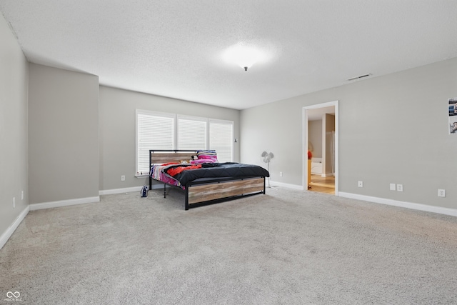 621 Fireside Dr, Greenwood, IN 46143 - carpeted bedroom with baseboards and a textured ceiling