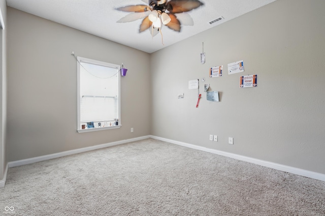 621 Fireside Dr, Greenwood, IN 46143 - empty room featuring ceiling fan, carpet, and baseboards