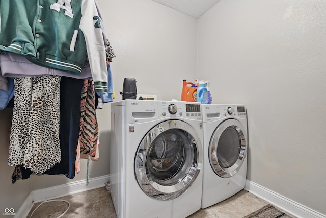 621 Fireside Dr, Greenwood, IN 46143 - washroom featuring washer and clothes dryer and baseboards